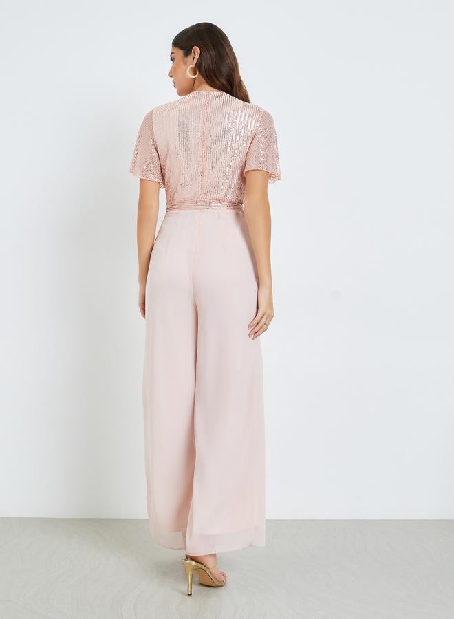 ستايلي جمبسوت لف مزين بالترتر - Image 3